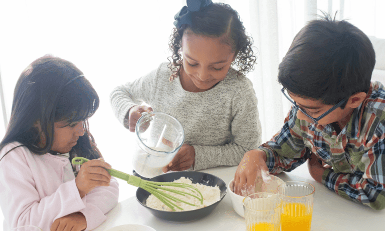 Kids baking together in the kitchen.