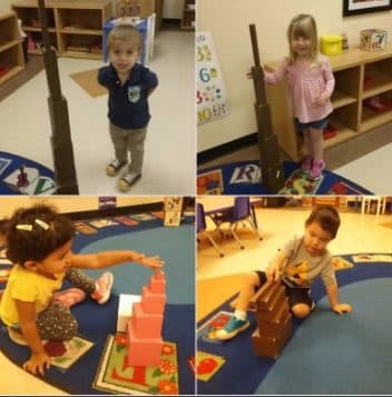 Four young children playing with building blocks.